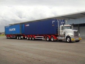 A Double road train fitted with a chek way on-board electronic mass scales, giving individual axle group weight and total combined weight. 